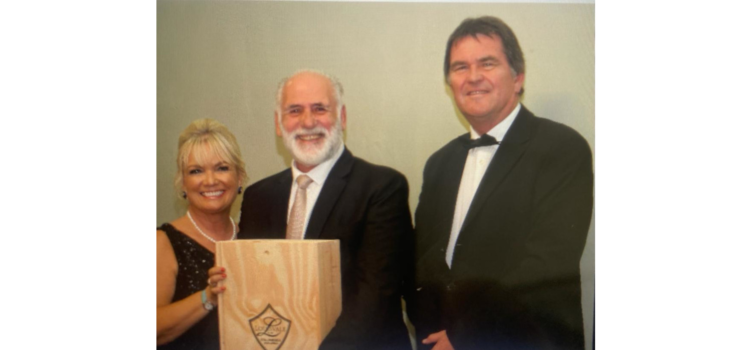 l-r: Chairperson of CTCB and Chairperson of Friends of Cape Town City Ballet, Suzette Raymond, with Dr Eduard Greyling receiving his special wine gift from Zane Meyer, Managing Director of Louisvale.